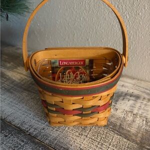Longaberger woven basket in yellow with red and green trim